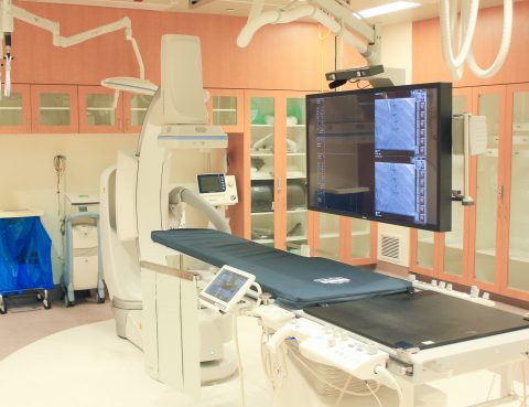 Canon ALPHENIX Cardiac Cath Lab hospital equipment in middle of room